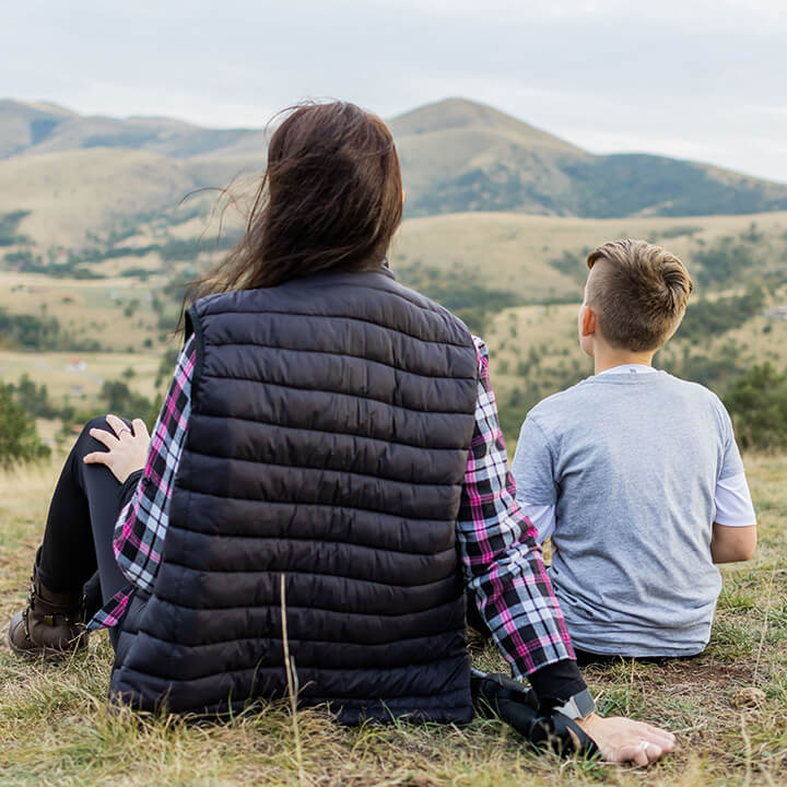 Mother comforting her child after divorce – support and healing with Love and Logic strategies.