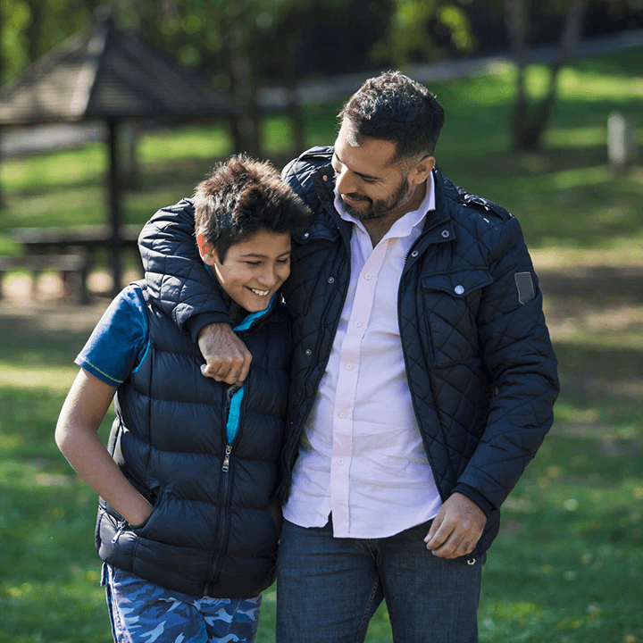 A father and son embracing