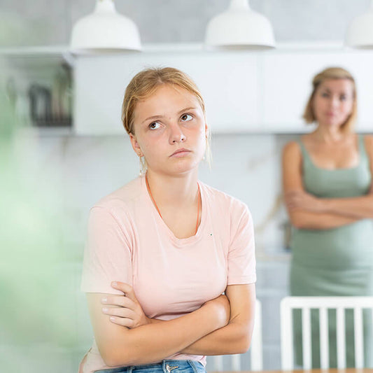 Parent handling back talk and disrespectful behavior from a teenager using calm parenting techniques